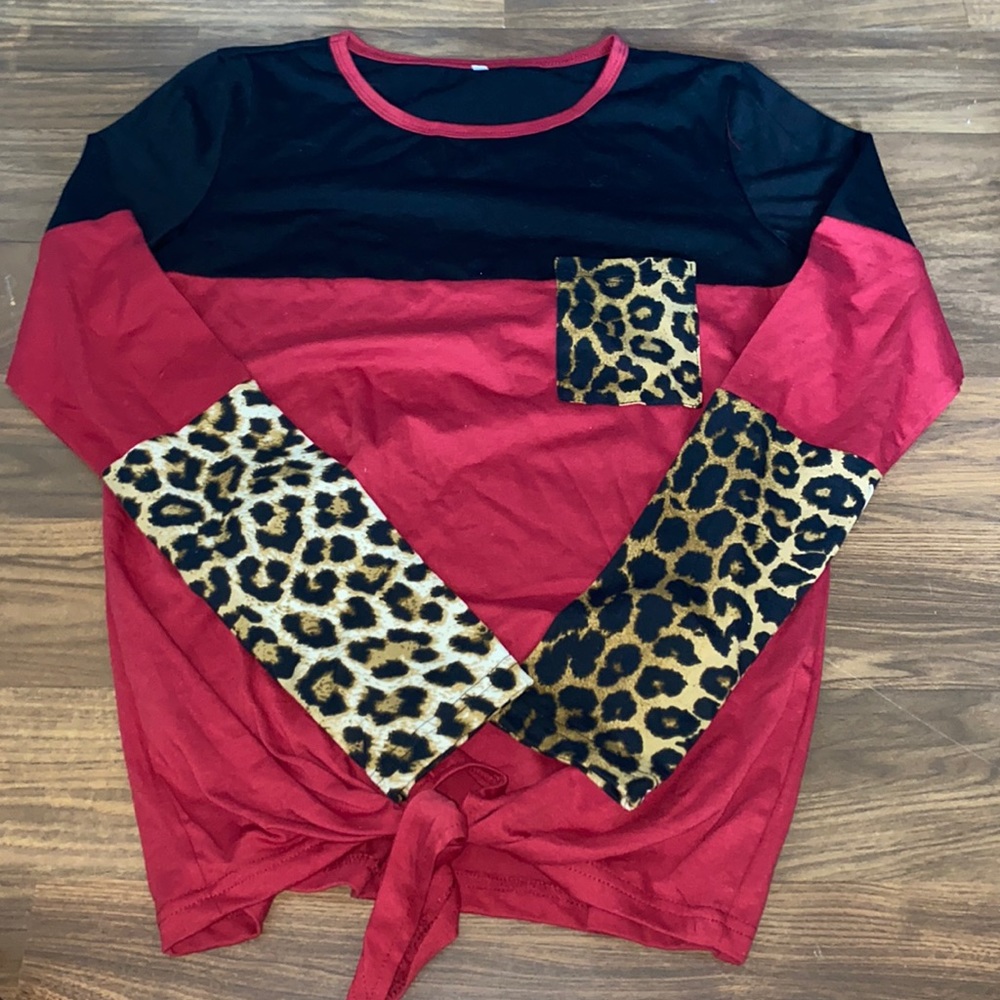 A long sleeve color block shirt.